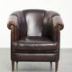 Set of a sheepskin sofa together with its matching club armchair