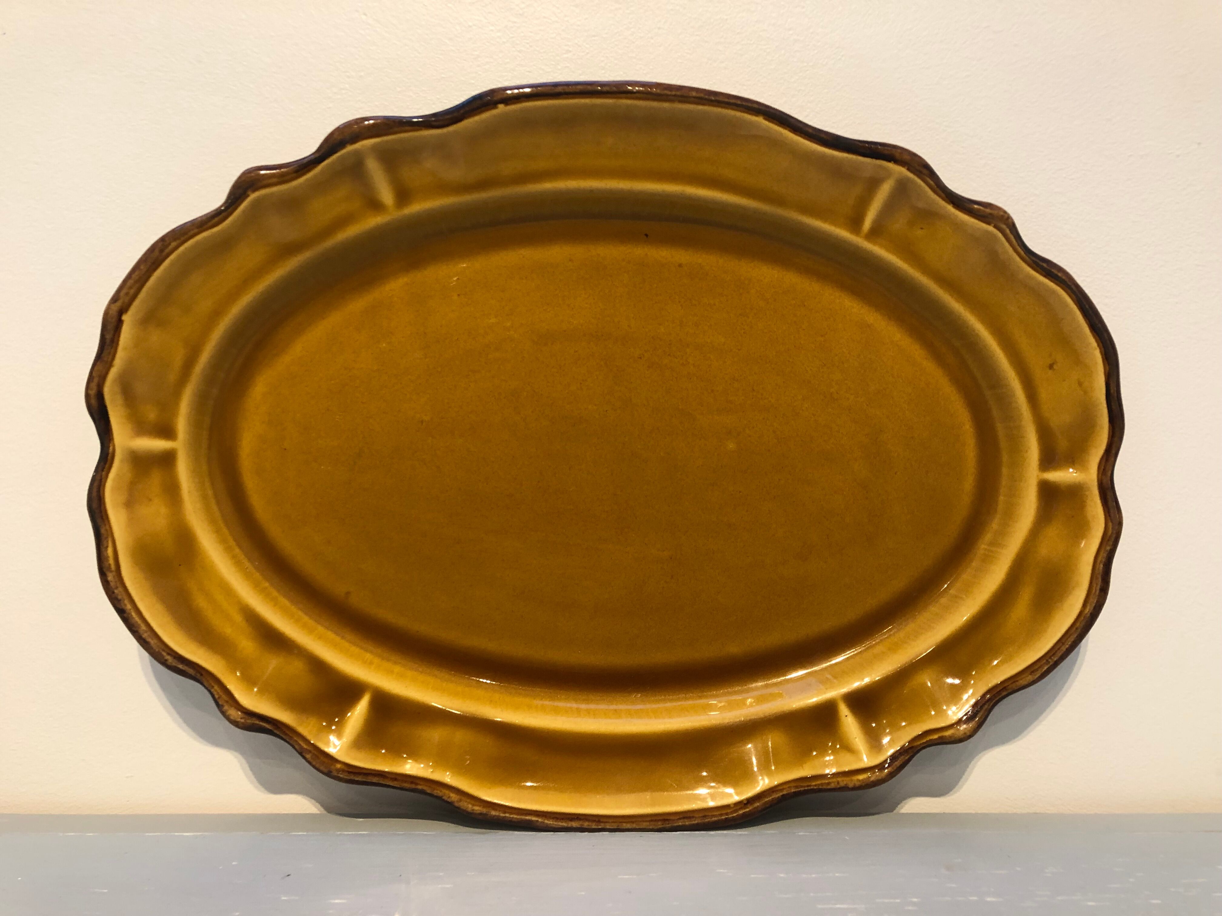 Oval dish caramel color chocolate brown edging signed faience haute provence made in France