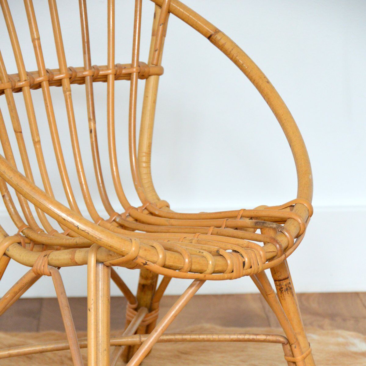 Children's shell armchair in rattan 1960s