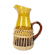 Carafe en verre ambré et dentelle d'osier