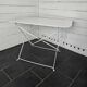 Old folding wrought iron garden table