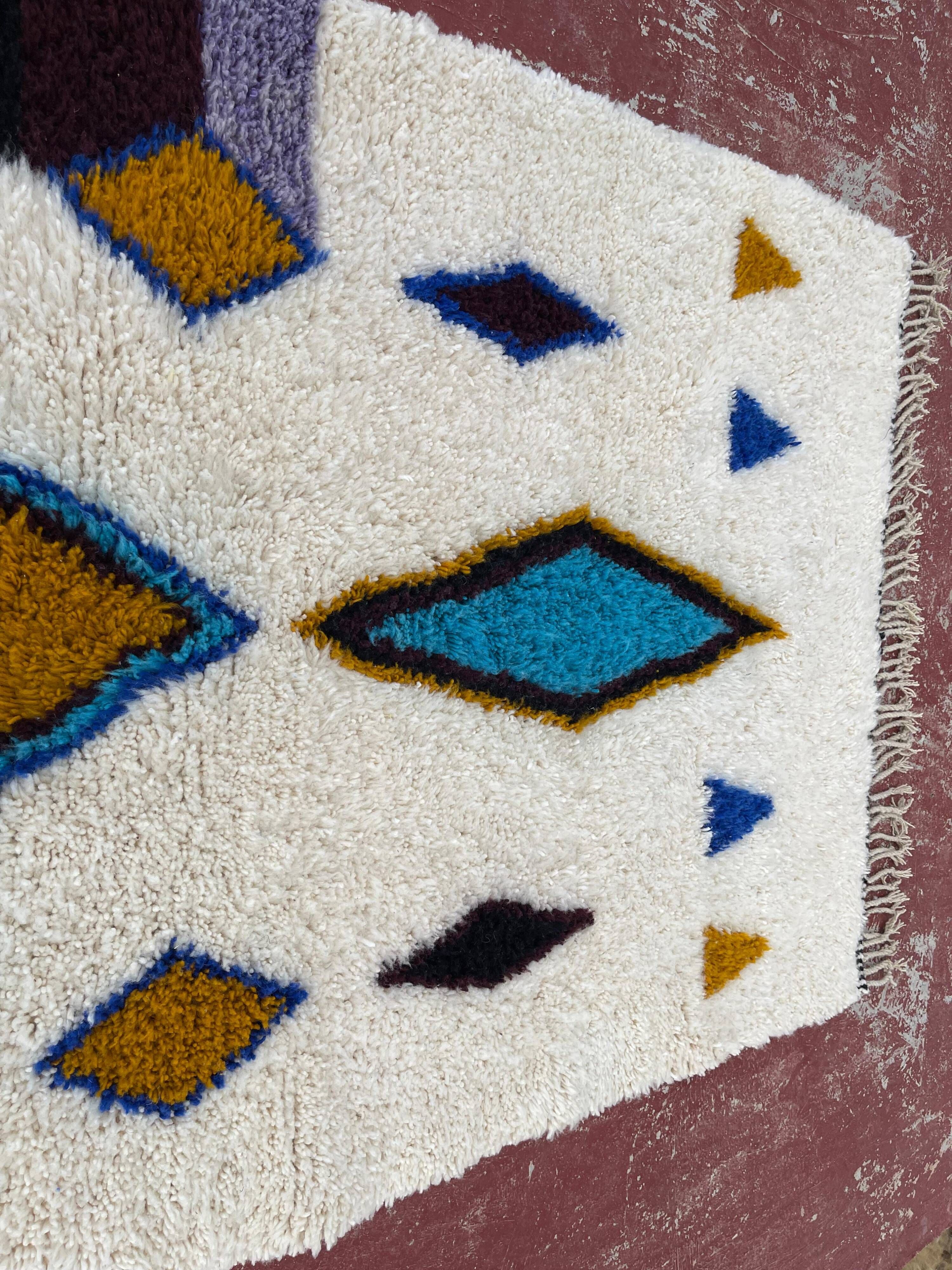 Moroccan Berber rug in cream and blue 250x150 cm – colourful geometric patterns