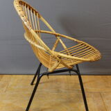 Living room in rattan and black lacquered iron by Rohe Noordwole circa 1950