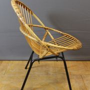 Living room in rattan and black lacquered iron by Rohe Noordwole circa 1950
