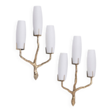 Pair of wall lights by Maison Arlus by Felix Agostini in bronze.