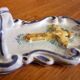 Antique enamelled faience holy water font with crucifix by Famulari Santo Stefeno.