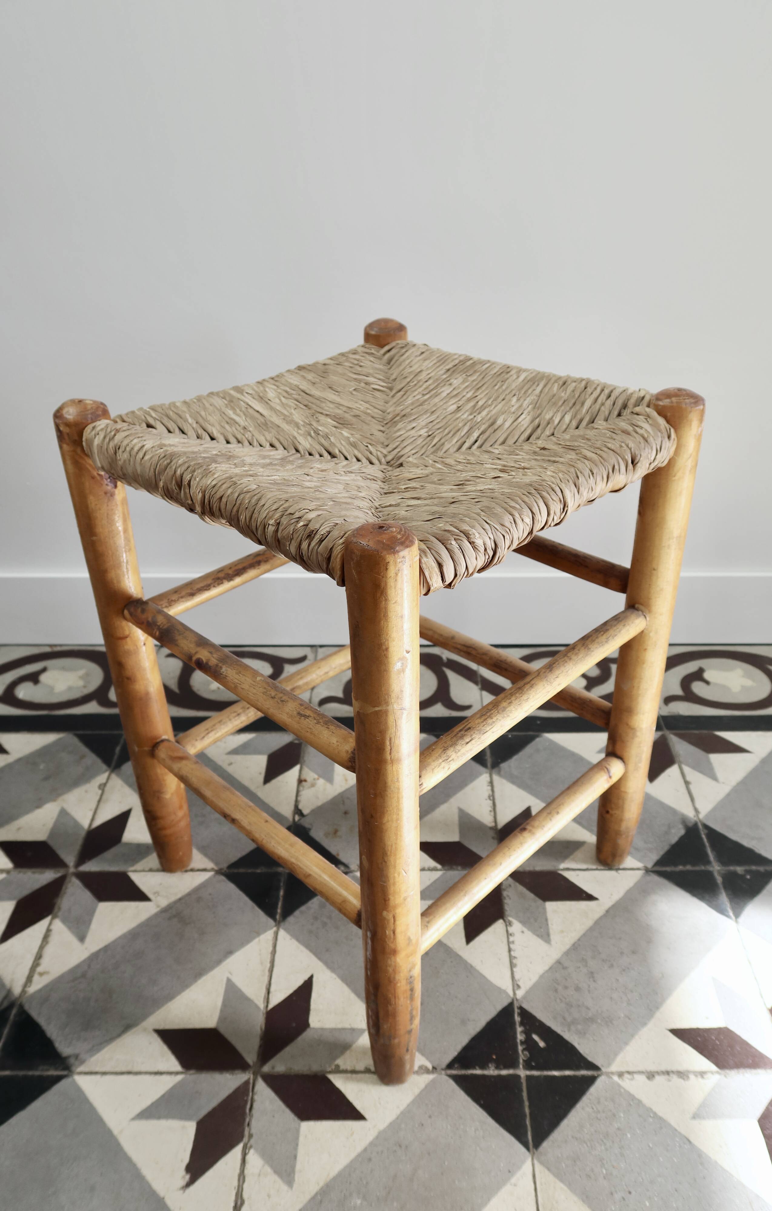 Vintage low stool in wood, honey yellow tones – Woven seat