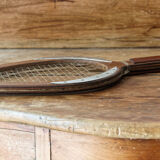 Palm, teak and mahogany game racket