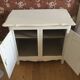 Small low cabinet with 2 doors