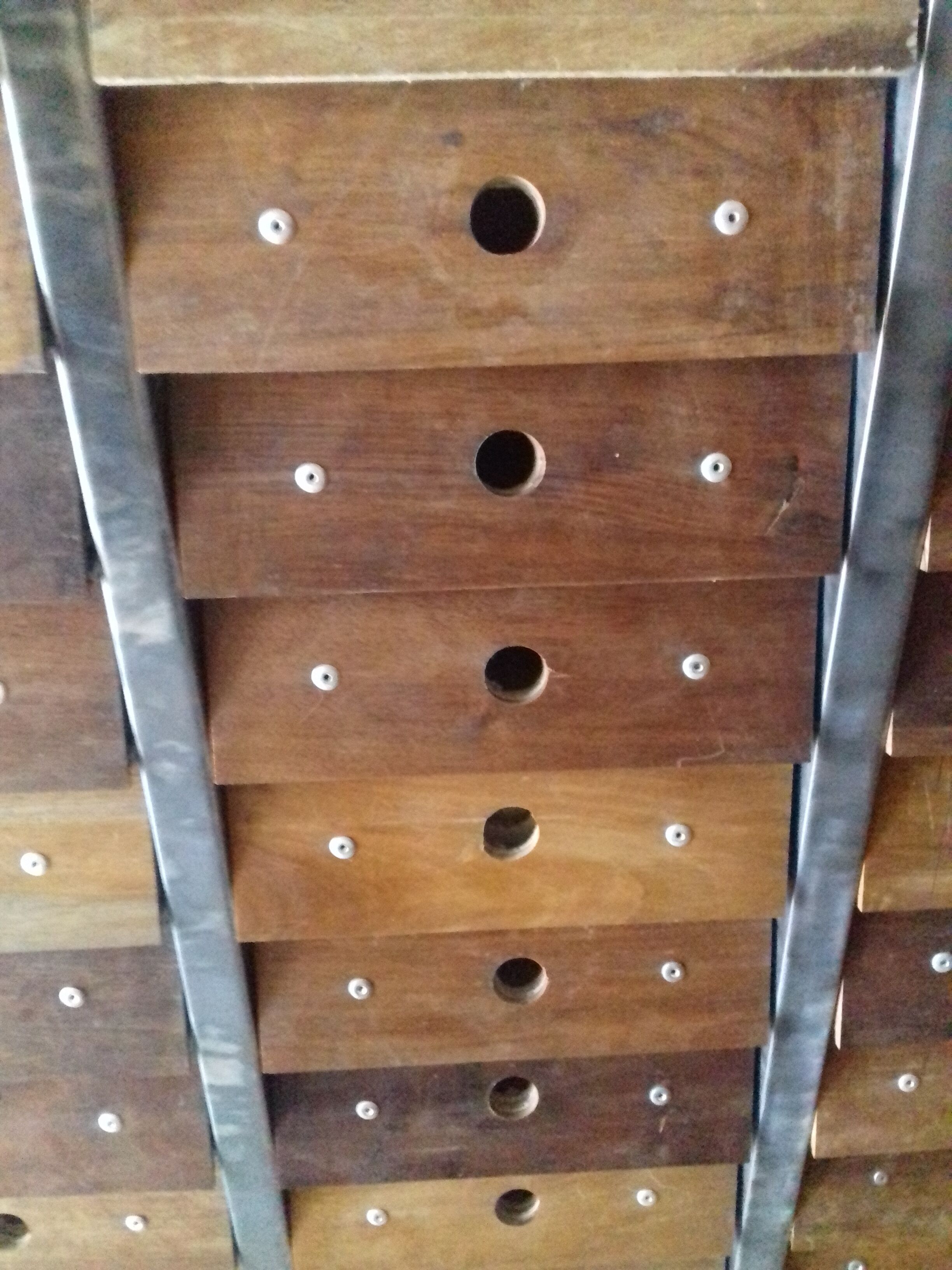 Clem industrial cabinet with 60 A4-sized drawers and riveted walnut fronts
