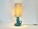 Pied de lampe bougeoir en céramique verte Art Déco et abat-jour raphia