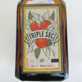 2 amber glass bottles with their old labels