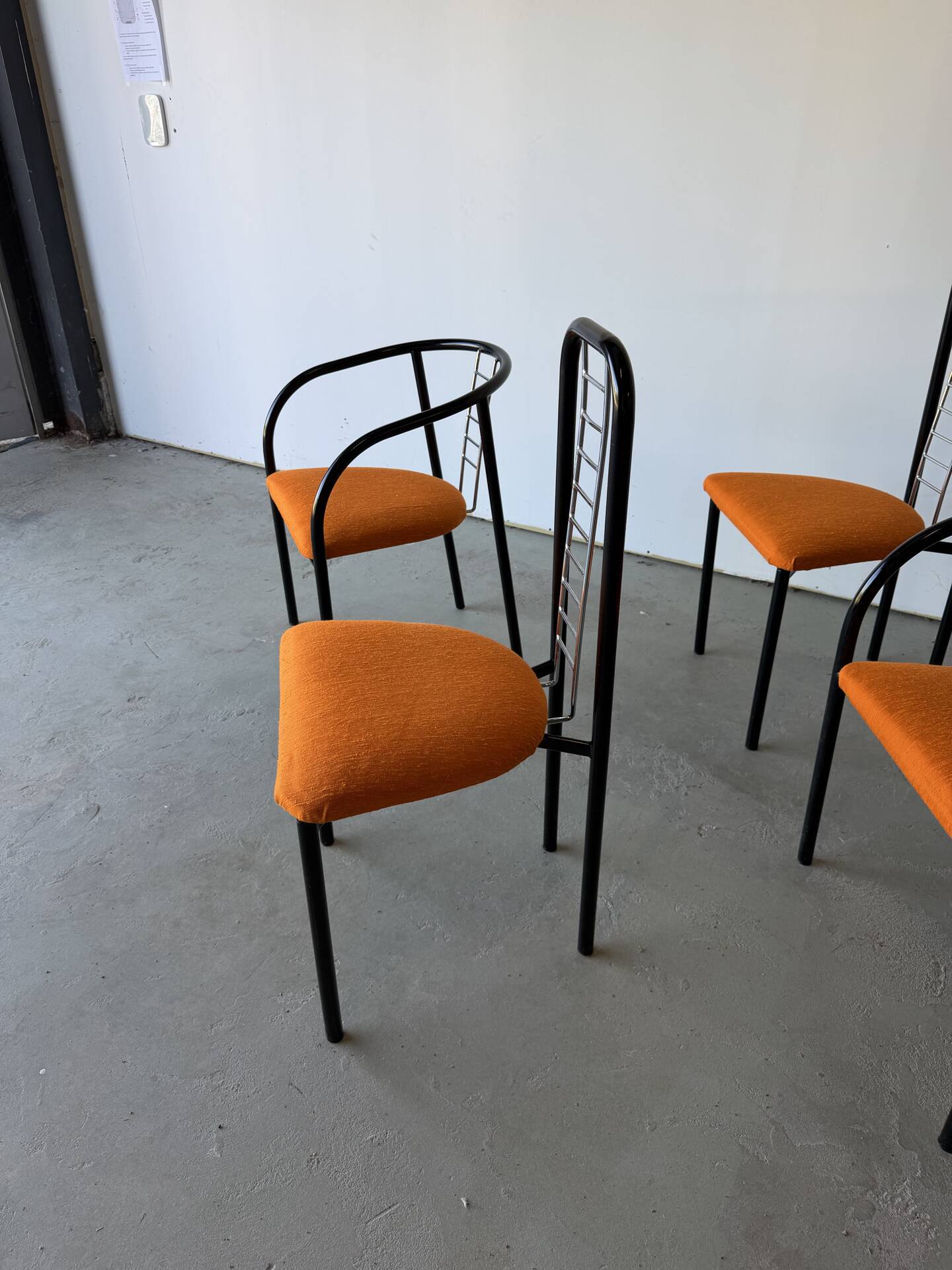 Set of 4 Italian design chairs in vintage black metal and chrome.