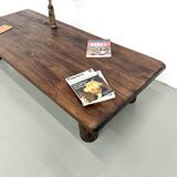 Modernist coffee table in solid elm, cylindrical pine base, 1970s.