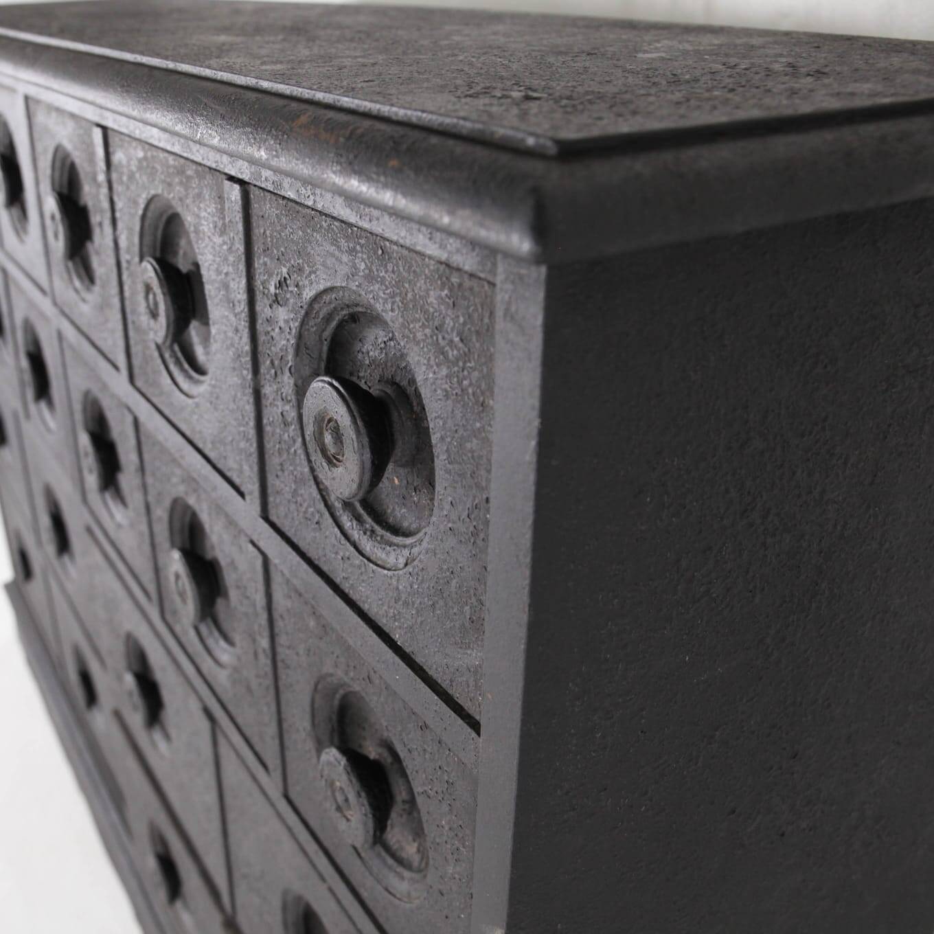 Blackened wooden chest of drawers