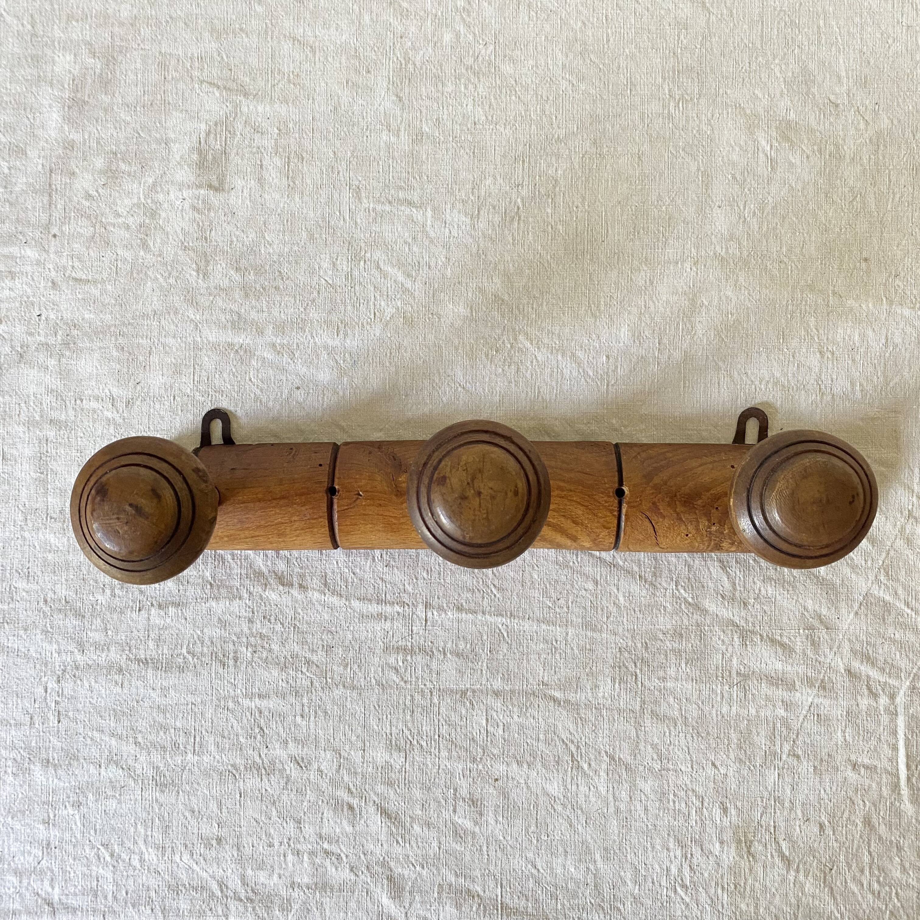 Antique wall coat rack, 3 hooks