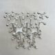 series of brutalist and sculptural silver-plated knife rests