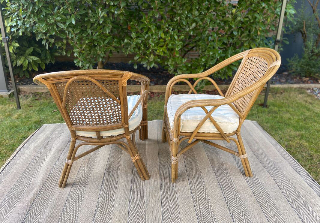 2 vintage armchairs in cannage and bamboo