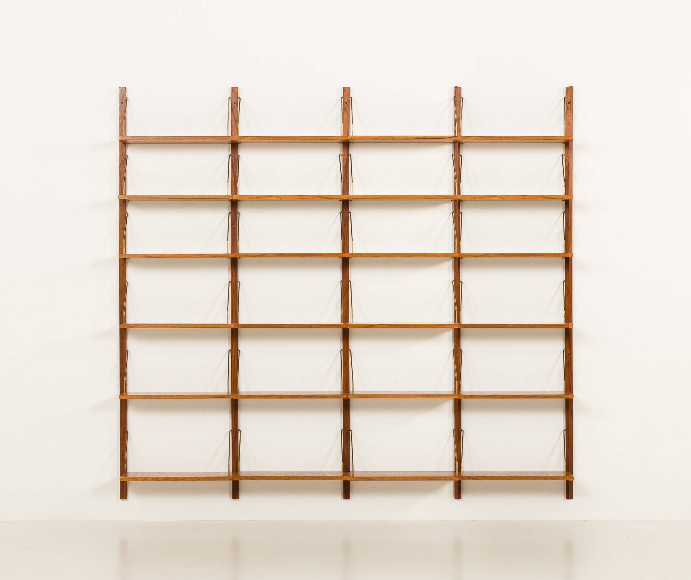 Danish teak 4 bay shelving unit in the style of Poul Cadovius, 1960s