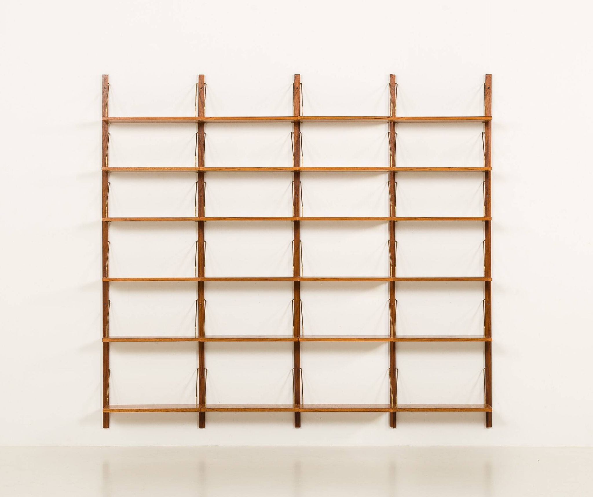 Danish teak 4 bay shelving unit in the style of Poul Cadovius, 1960s