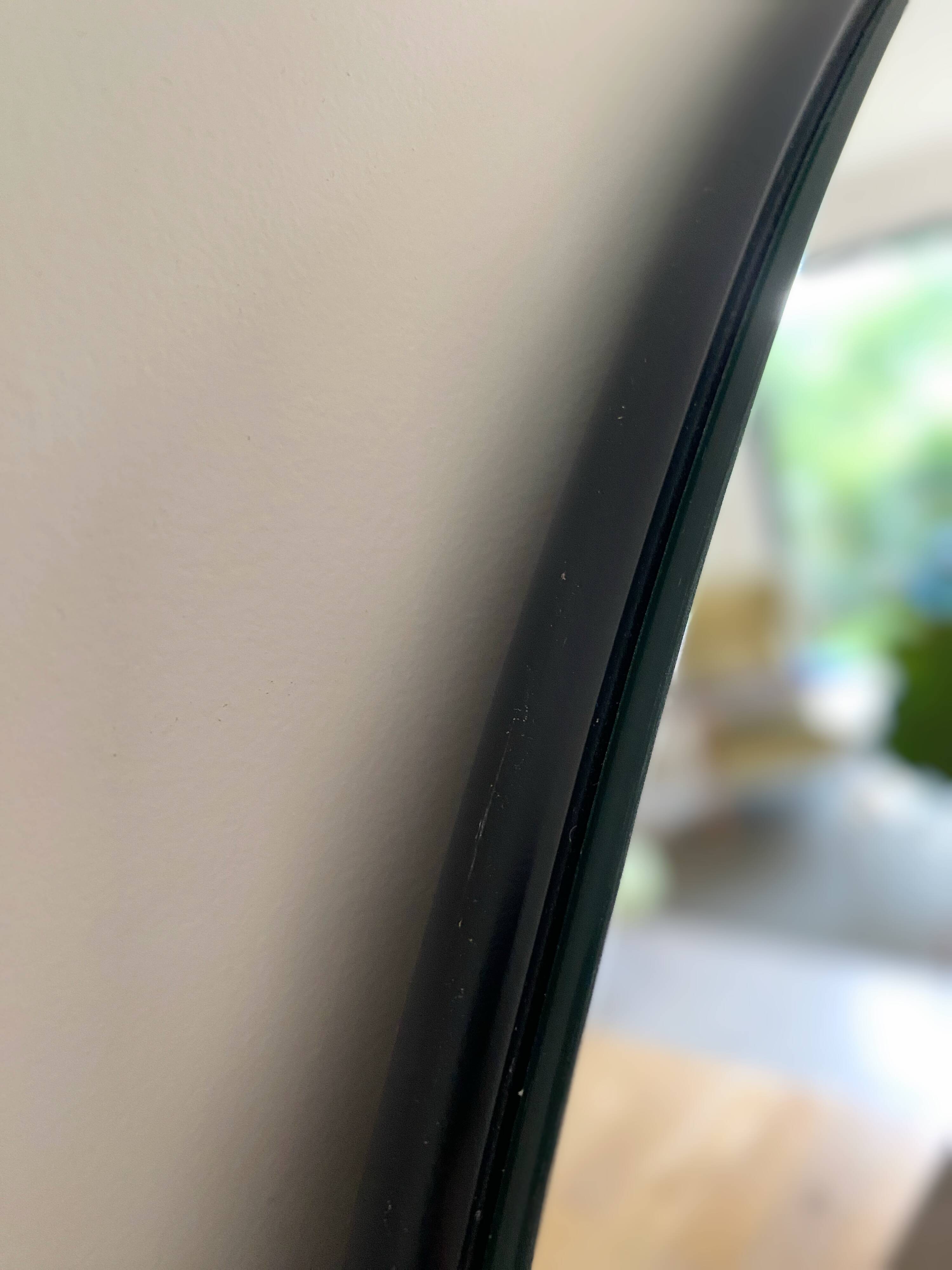 Round mirror, diameter 90 cm, mounted on MDF panel, black tinted frame