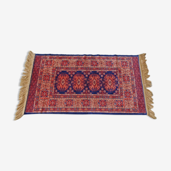 Orient carpet blue red with fringes