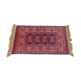 Tapis d’Orient bleu rouge avec franges