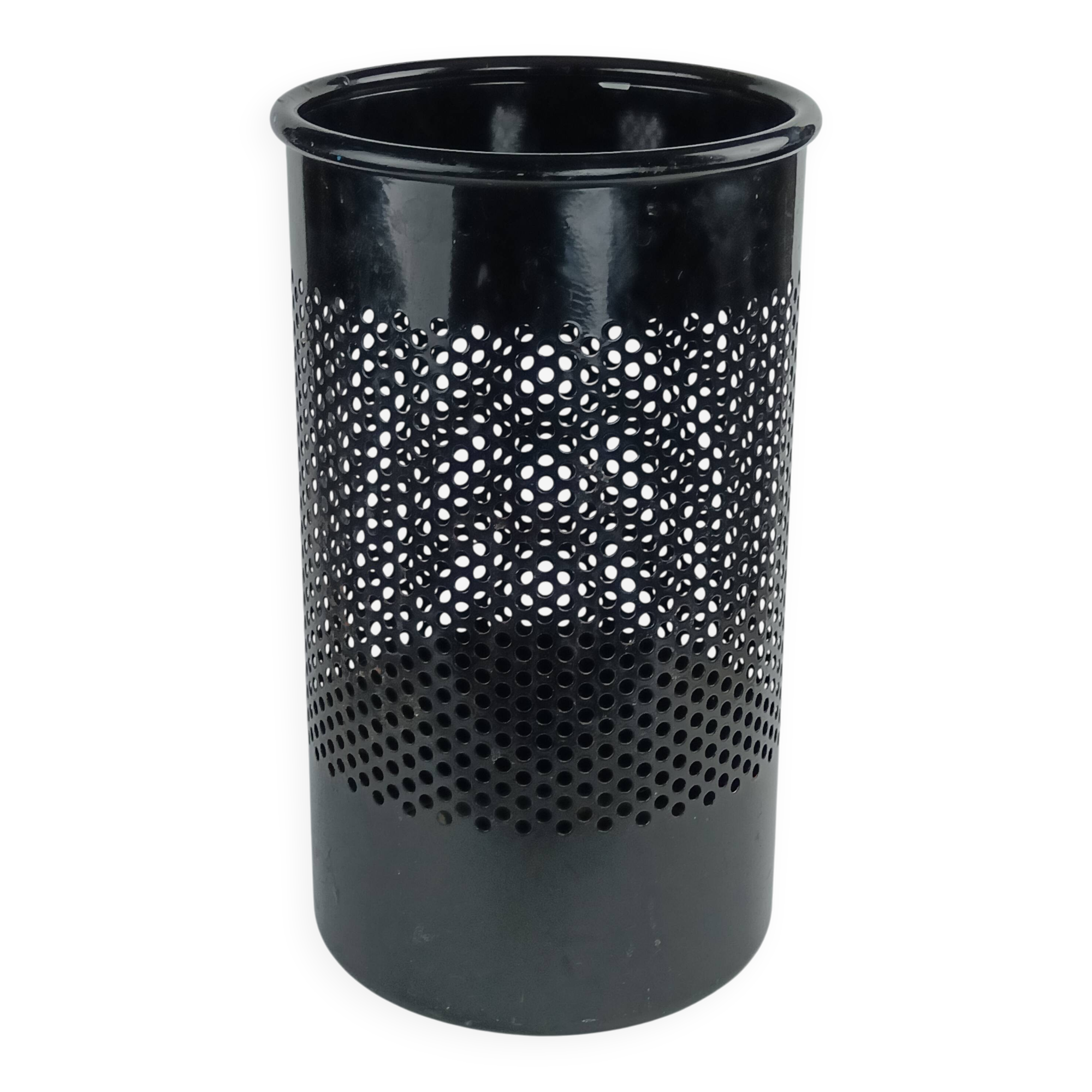 Perforated metal wastebasket