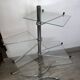 Four-tier rotating shelf in chrome metal