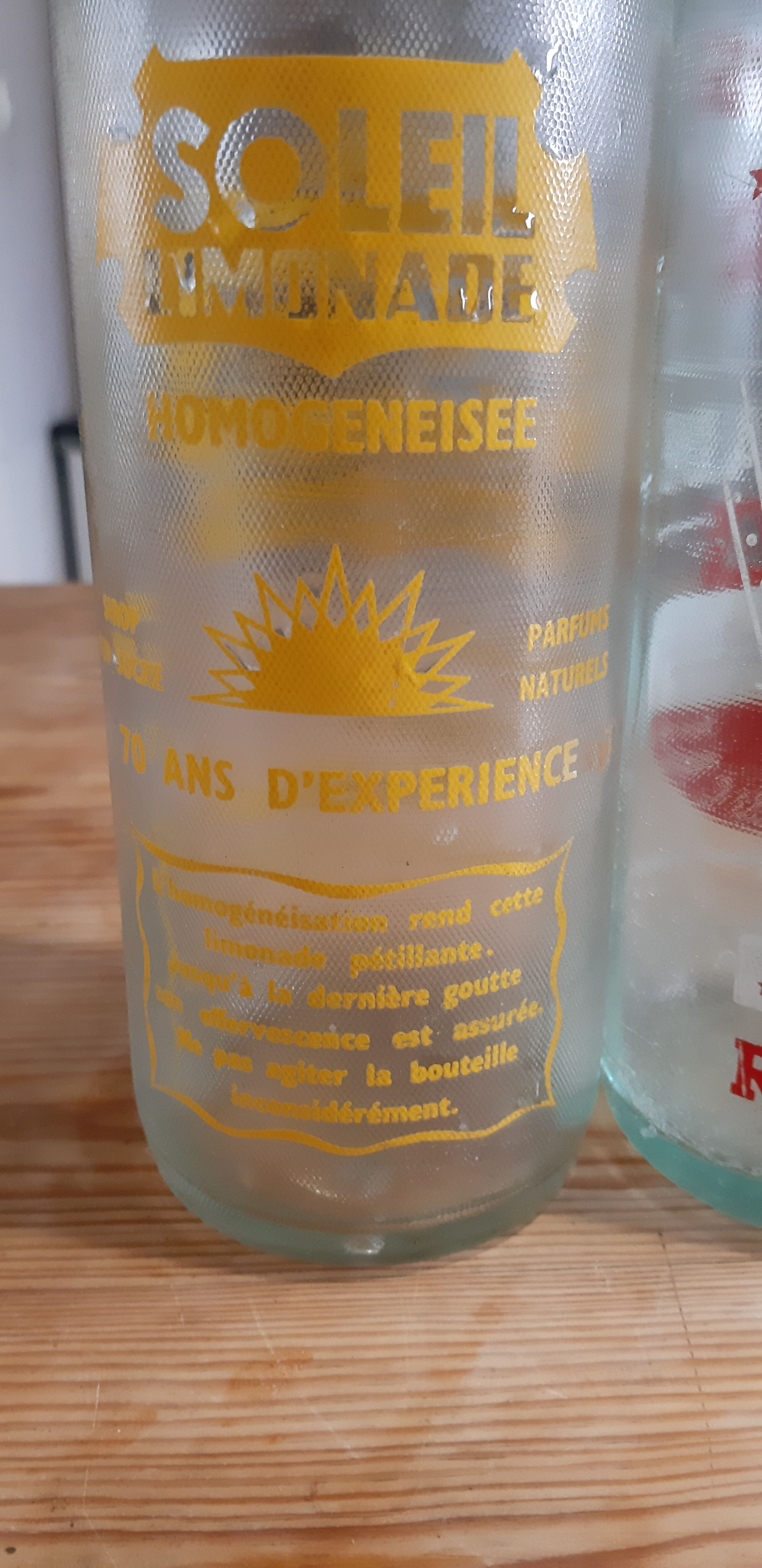 2 bottles of vintage lemonade from the 50s in glass