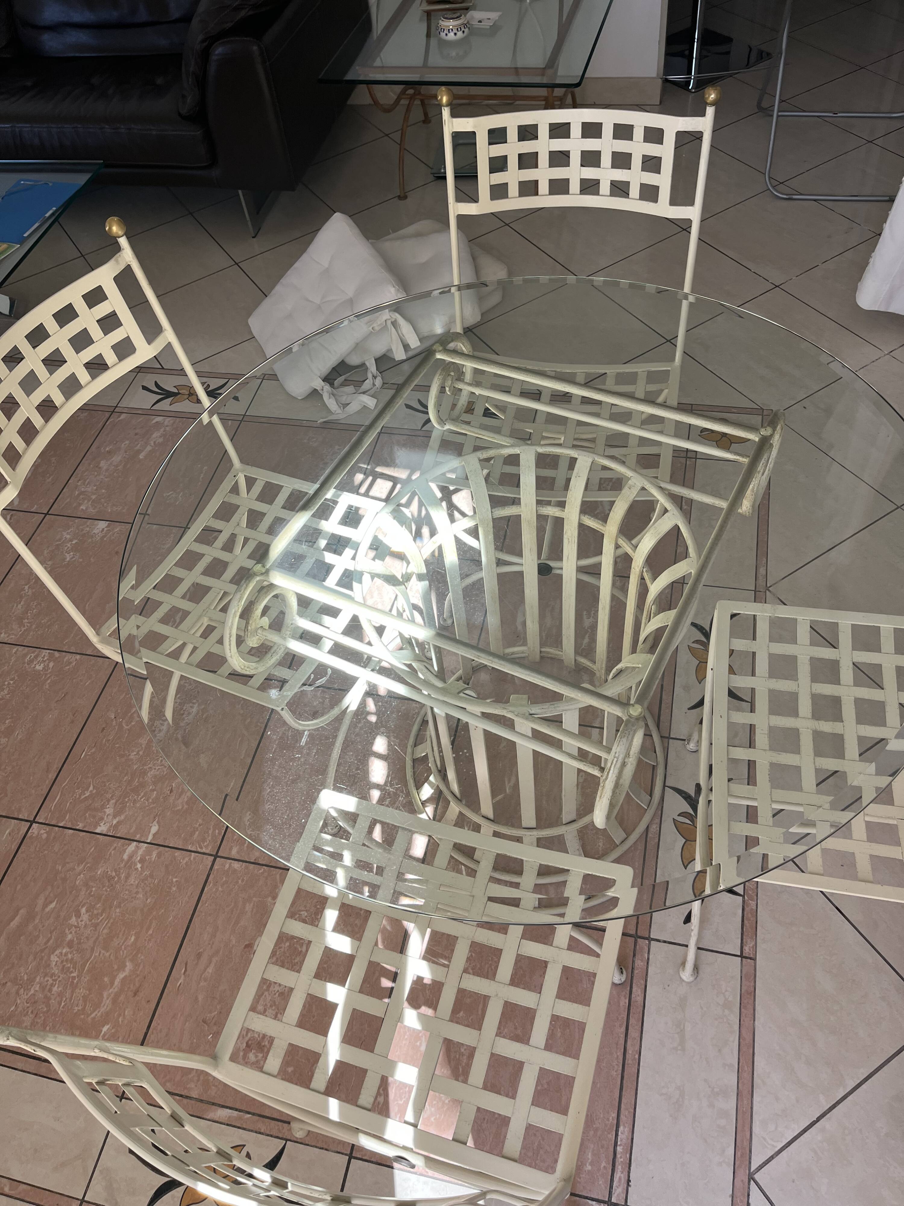 Wrought iron round table and 4 chairs