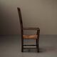 Old peasant armchair in solid wood and woven straw – Auvergne, 19th century.