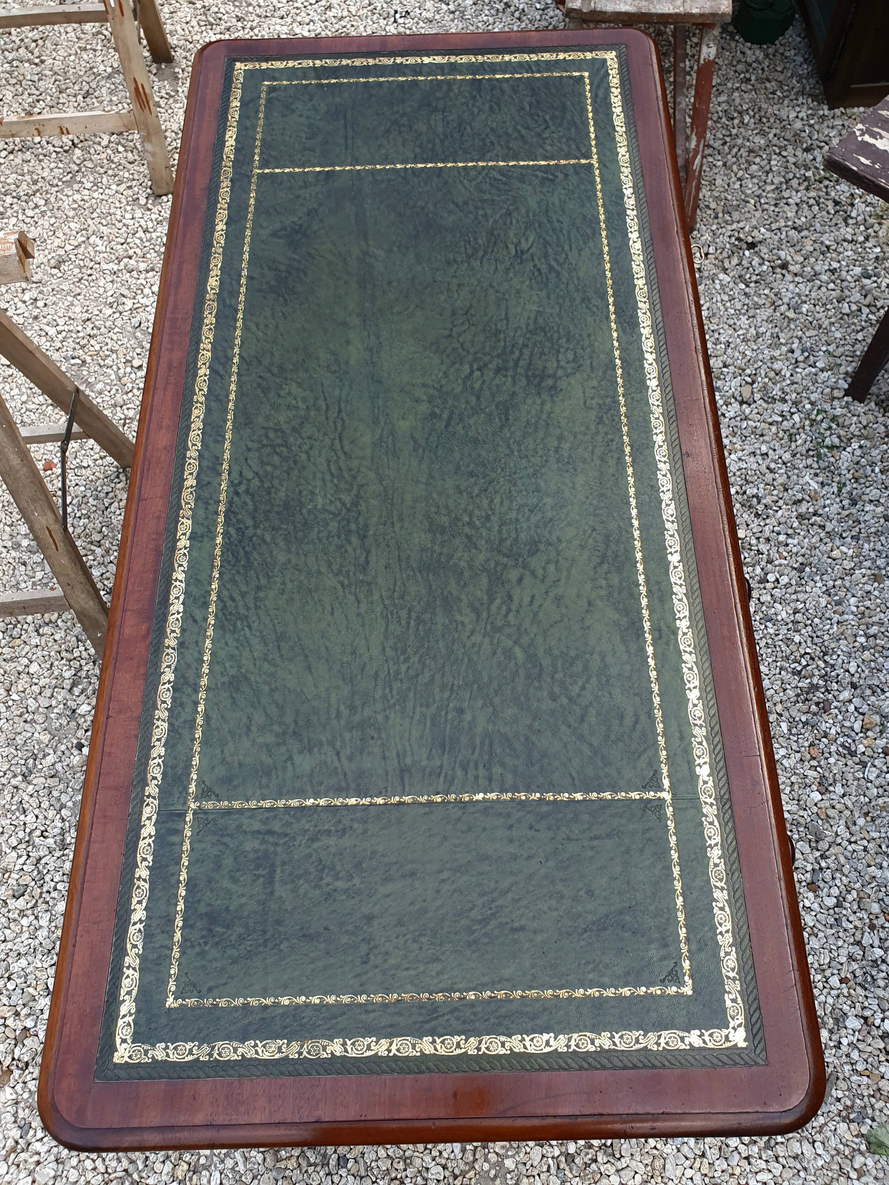 English desk with 2 drawers on green leather