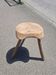 Old wooden tripod stool