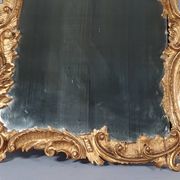 Mirror circa 1800, carved and gilded wooden frame, rocaille decoration, 54x39 cm, C227