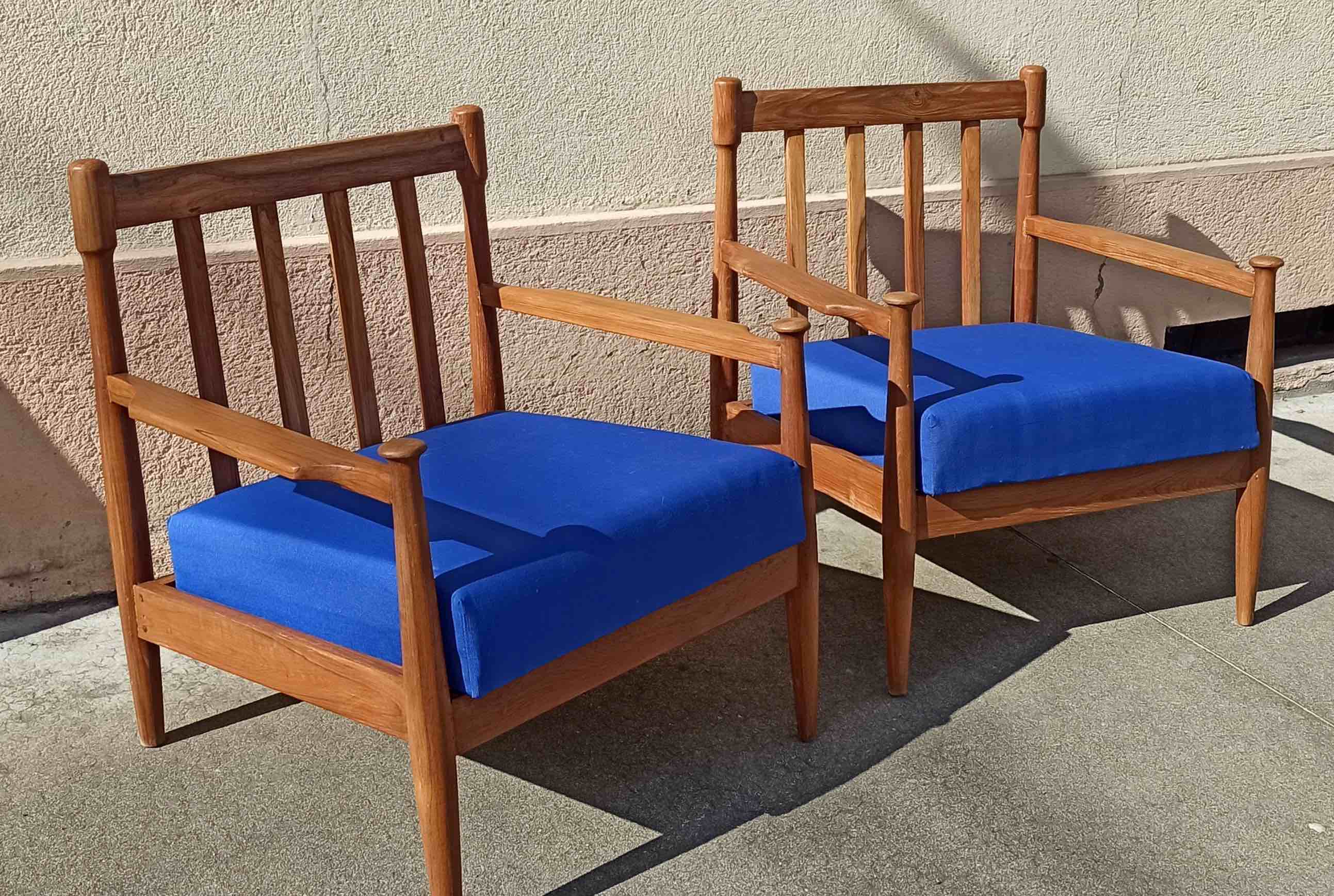 Pair of scandinavian armchairs in solid teak 50s