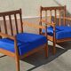 Pair of scandinavian armchairs in solid teak 50s