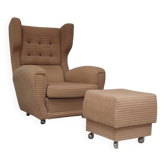 Beige wingback armchair and TVAR footrest, former Czechoslovakia.