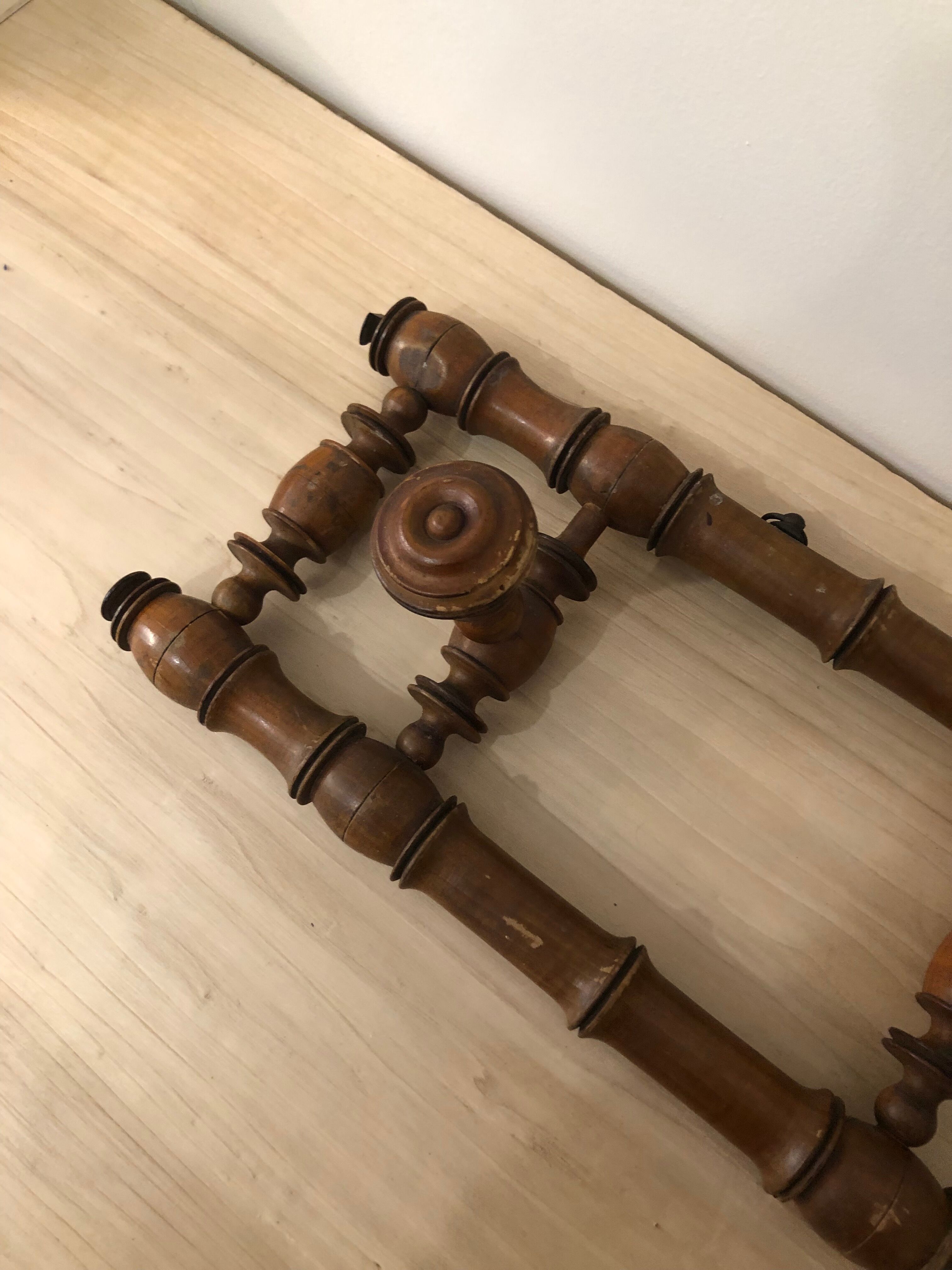 Wooden coat rack with swivel hooks