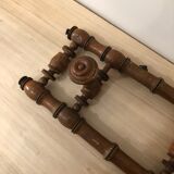 Wooden coat rack with swivel hooks