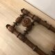 Wooden coat rack with swivel hooks