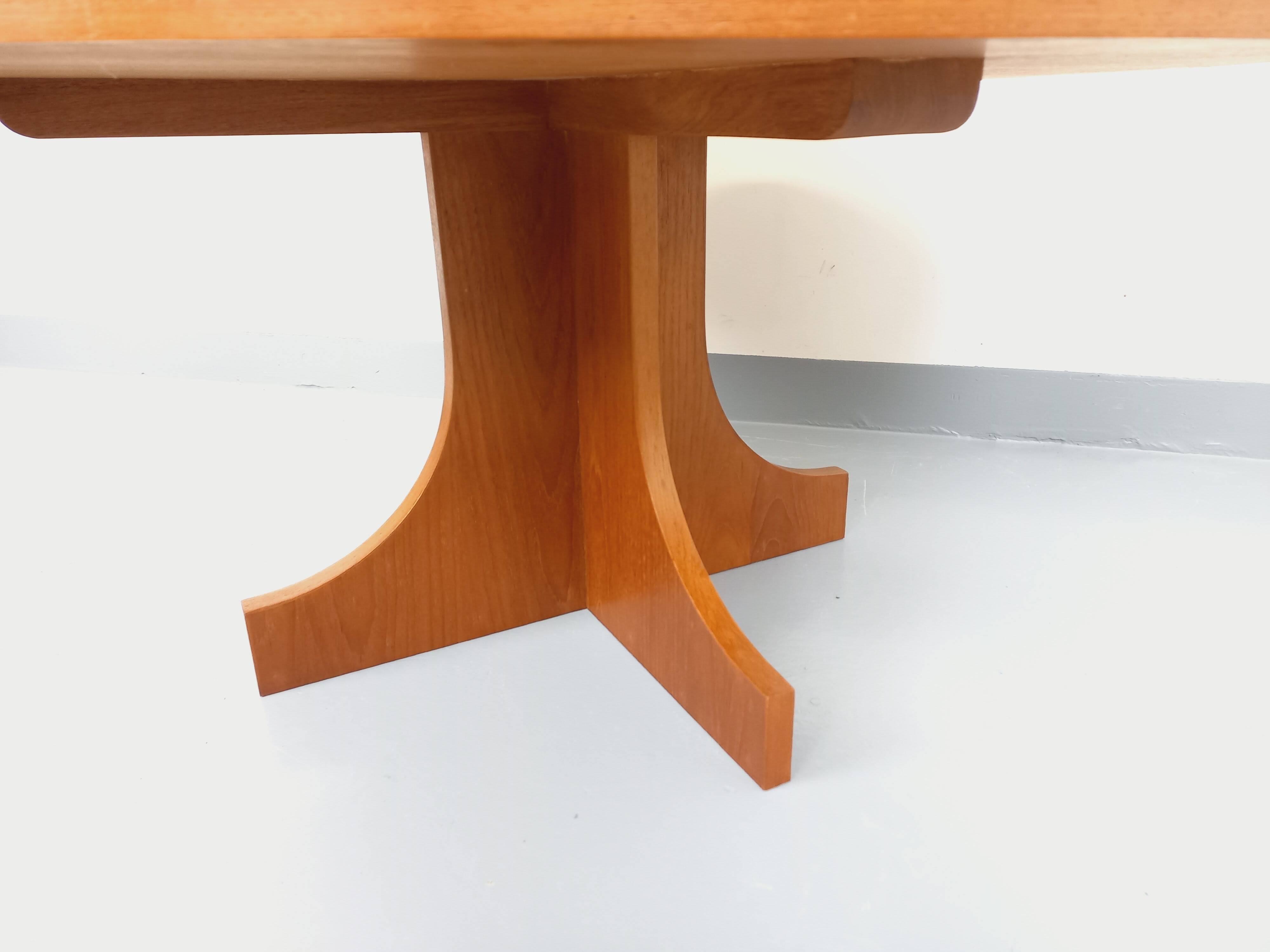 Vintage English round teak coffee table from the 1960s