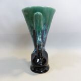 Praticality black and green vase numbered 666