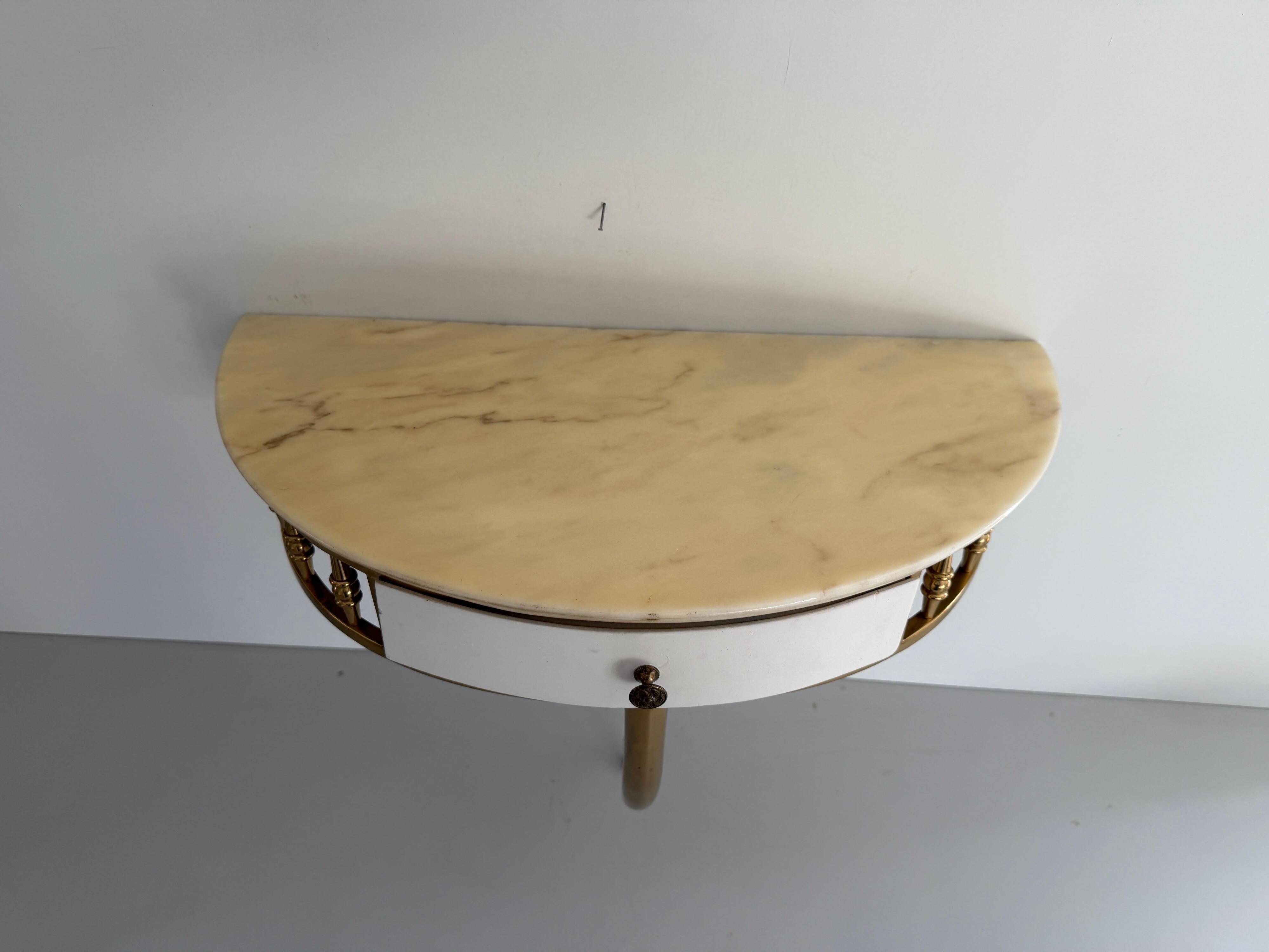 Floating wall console with drawer, brass body and marble top, 1960s, Italy