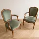 Pair of cabriolet armchairs in Louis XV style in green velvet.