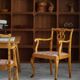 A pair of English Chippendale style armchairs in birch, 20th century, England.