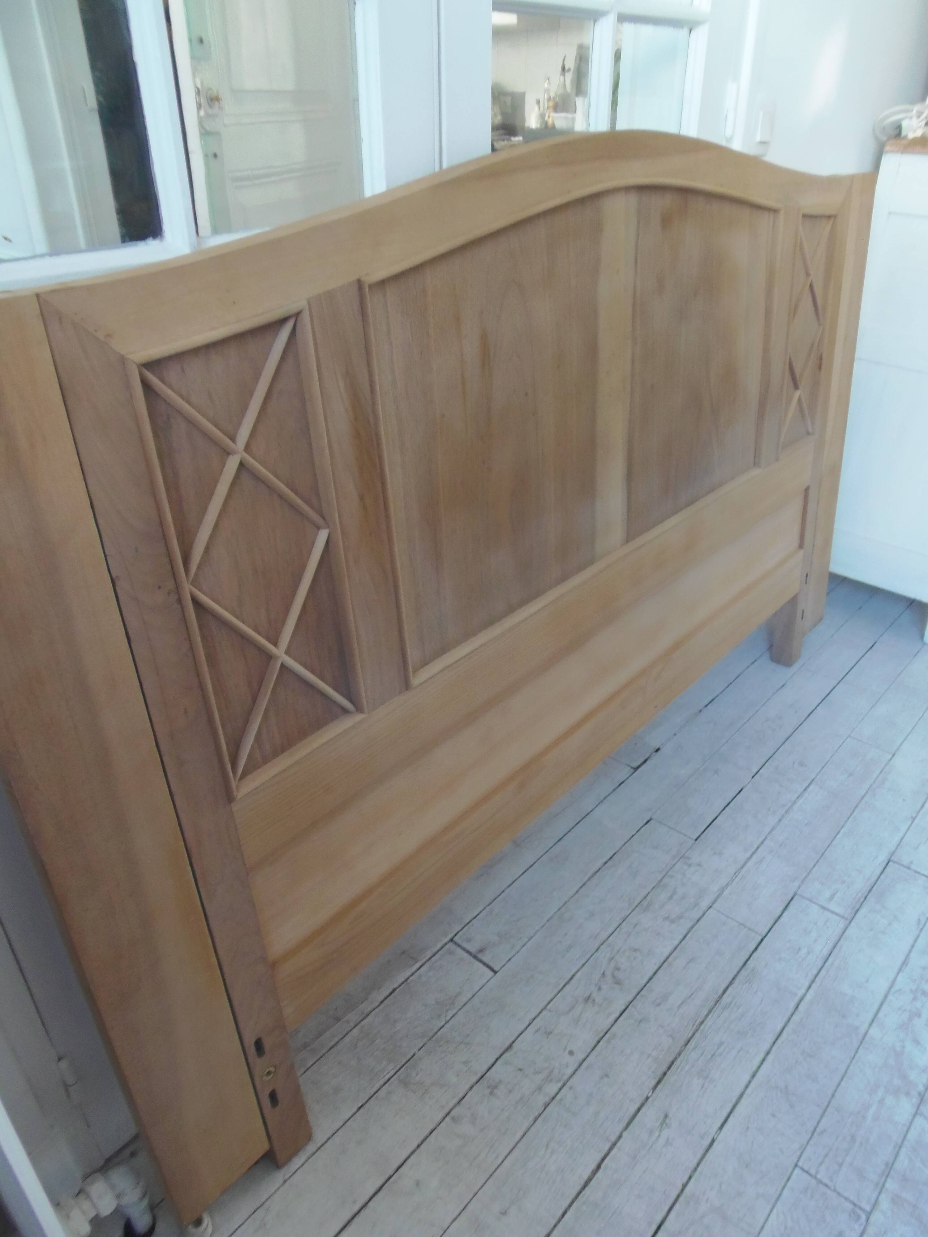 Headboard for a 160 bed in solid walnut with waxed finish.