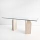 Dining table in travertine and glass with sculpted legs, 1970s.