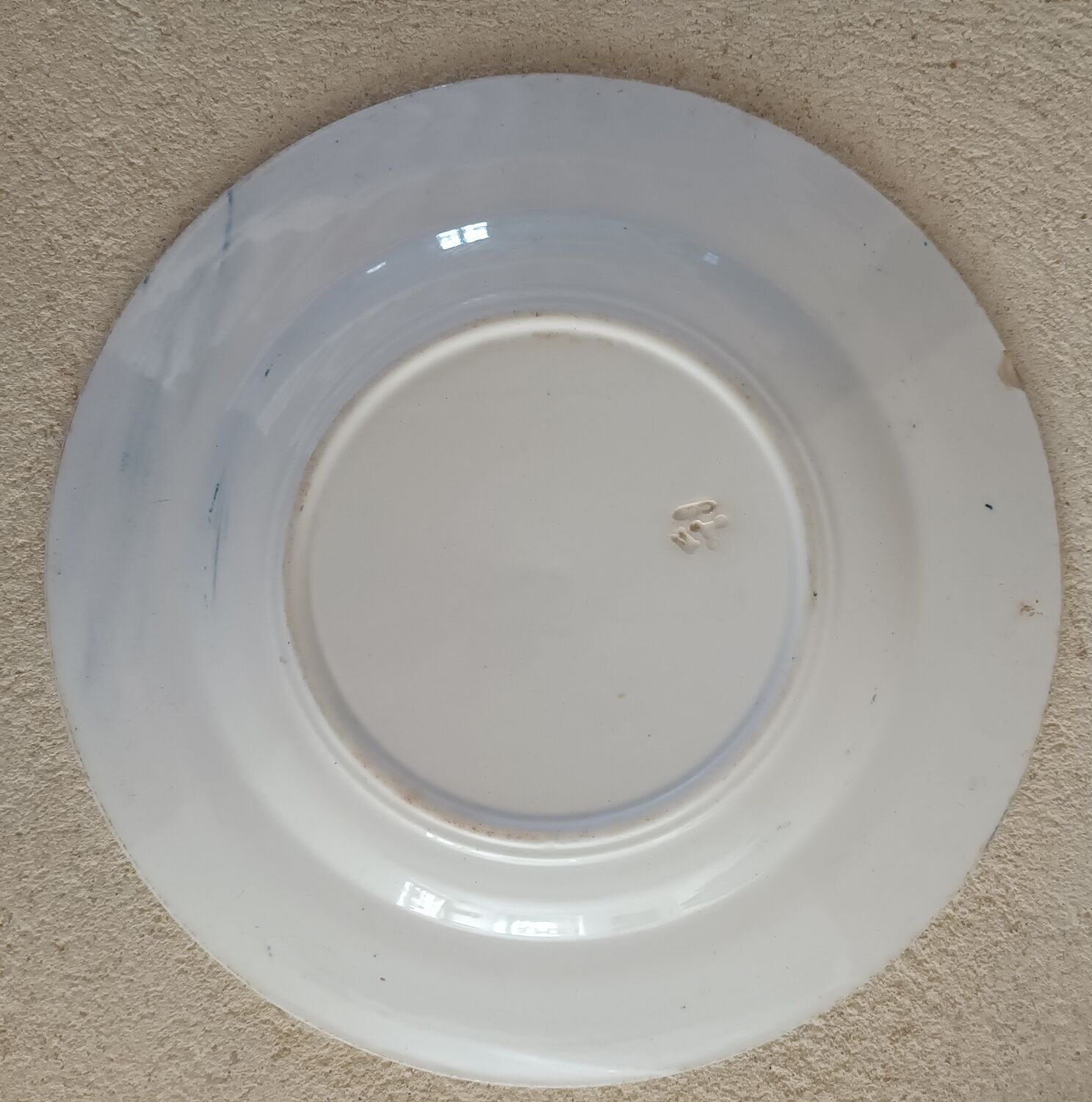 2 mismatched ironstone plates