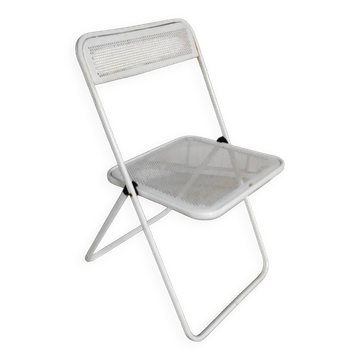 Perforated metal folding chair